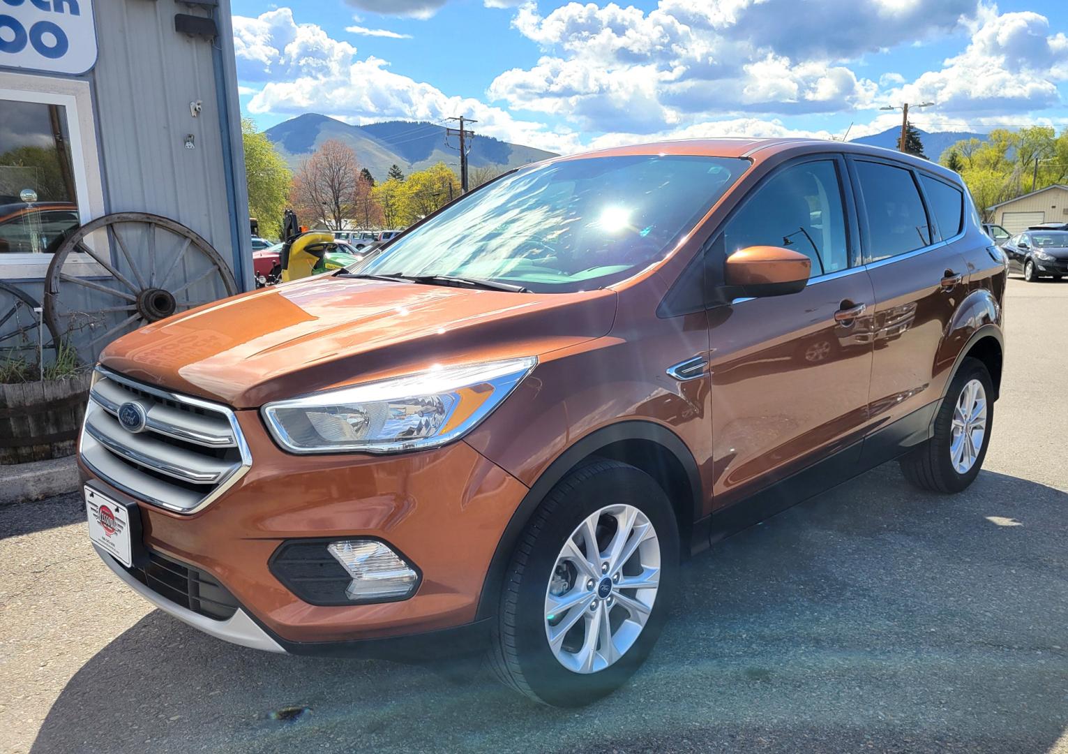 2017 Copper /Black Ford Escape SE (1FMCU9GD1HU) with an 1.5L I4 engine, 6 Speed Auto transmission, located at 450 N Russell, Missoula, MT, 59801, (406) 543-6600, 46.874496, -114.017433 - Nice Low Mile All Wheel Drive. Only 59K Miles. 1.5L I4 Engine. 6 Speed Automatic Transmission. Very Clean. Power drivers Seat. Air. Cruise. Tilt. Power Windows and Locks. Backup Camera. - Photo#2